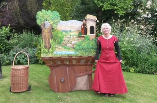Medieval Puppet Show on a cart